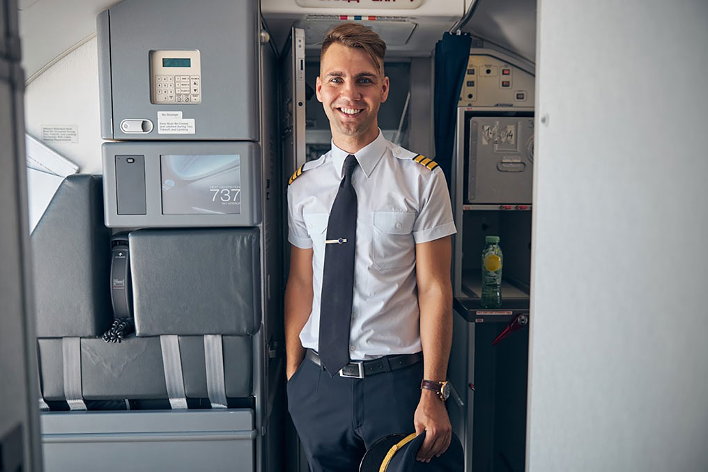 male pilot and cabin crew