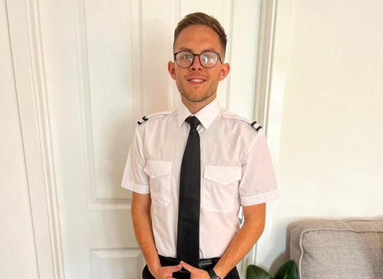 Young student pilot training for commercial pilots license