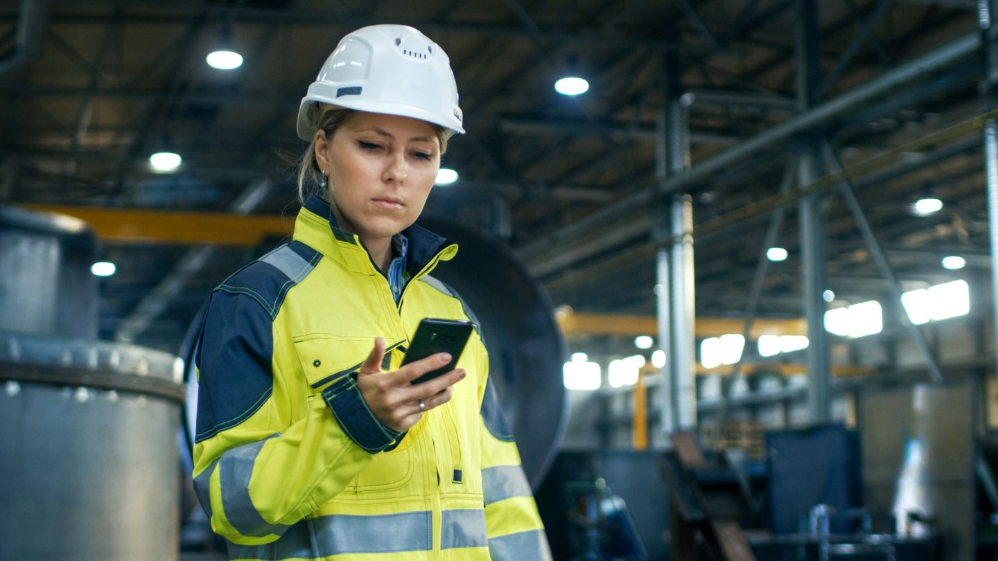 engineer checking their phone
