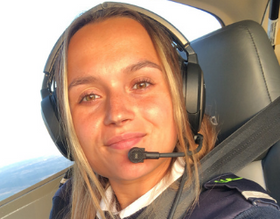 Young female Pilot flying