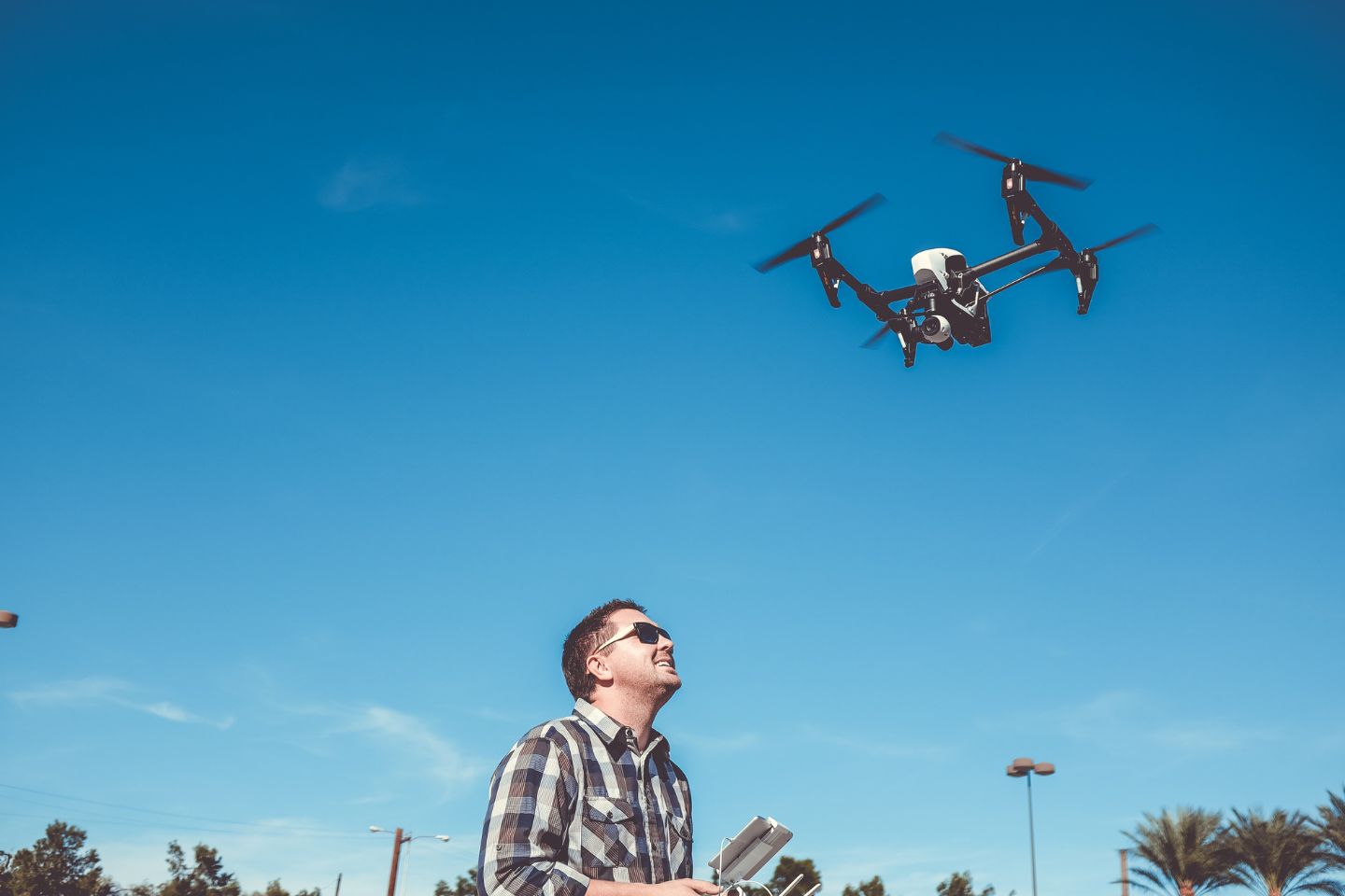 drone being flown by drone pilot