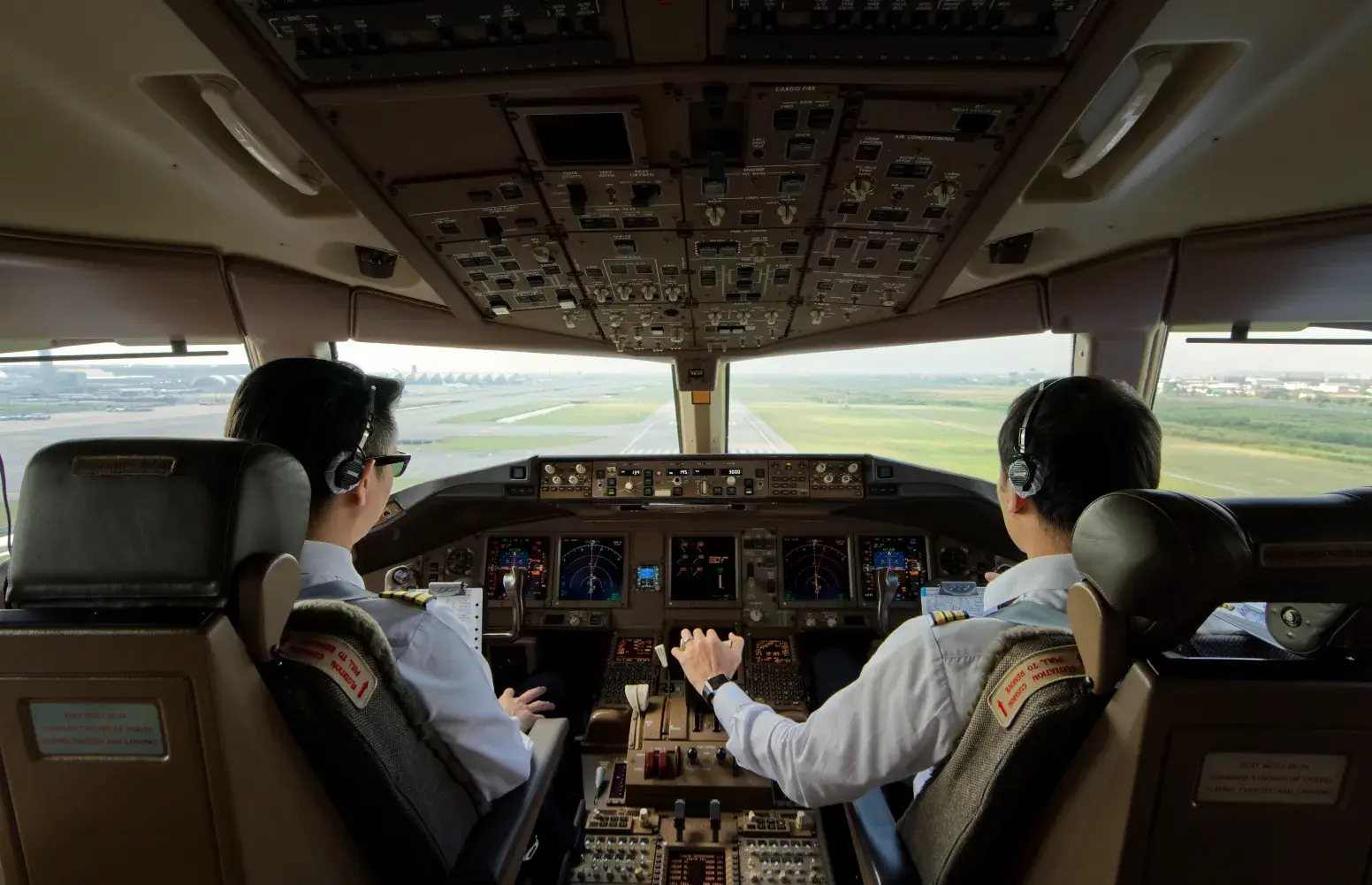 Pilots in a flight deck