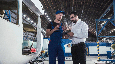 two engineers discussing a task