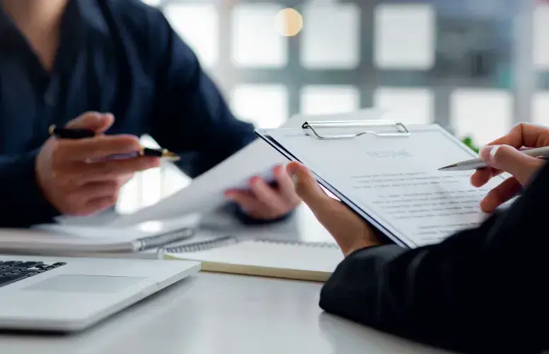 Recruiters discussing CV